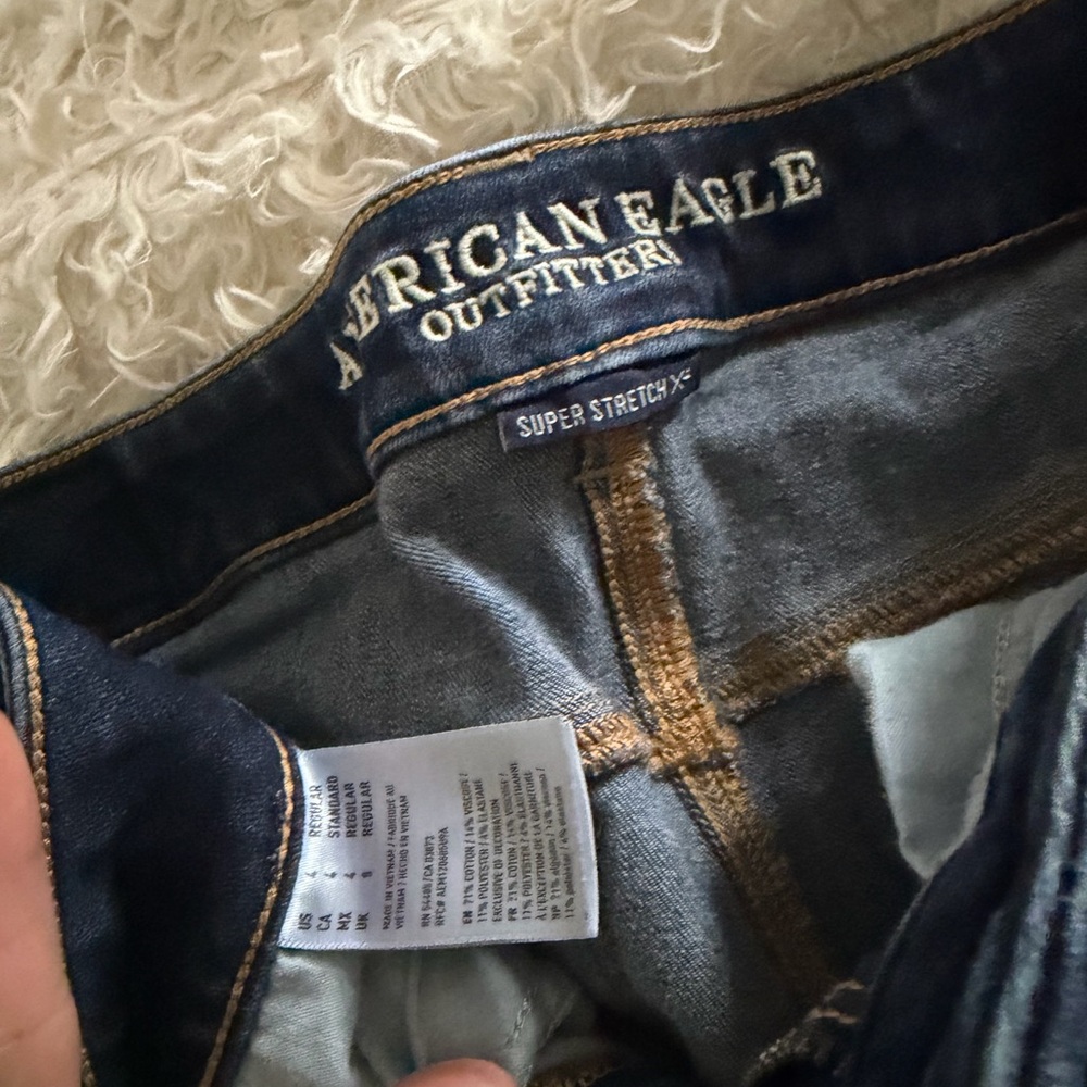 American Eagle Outfitters Dark Blue Denim Jeans with Tan Stitching